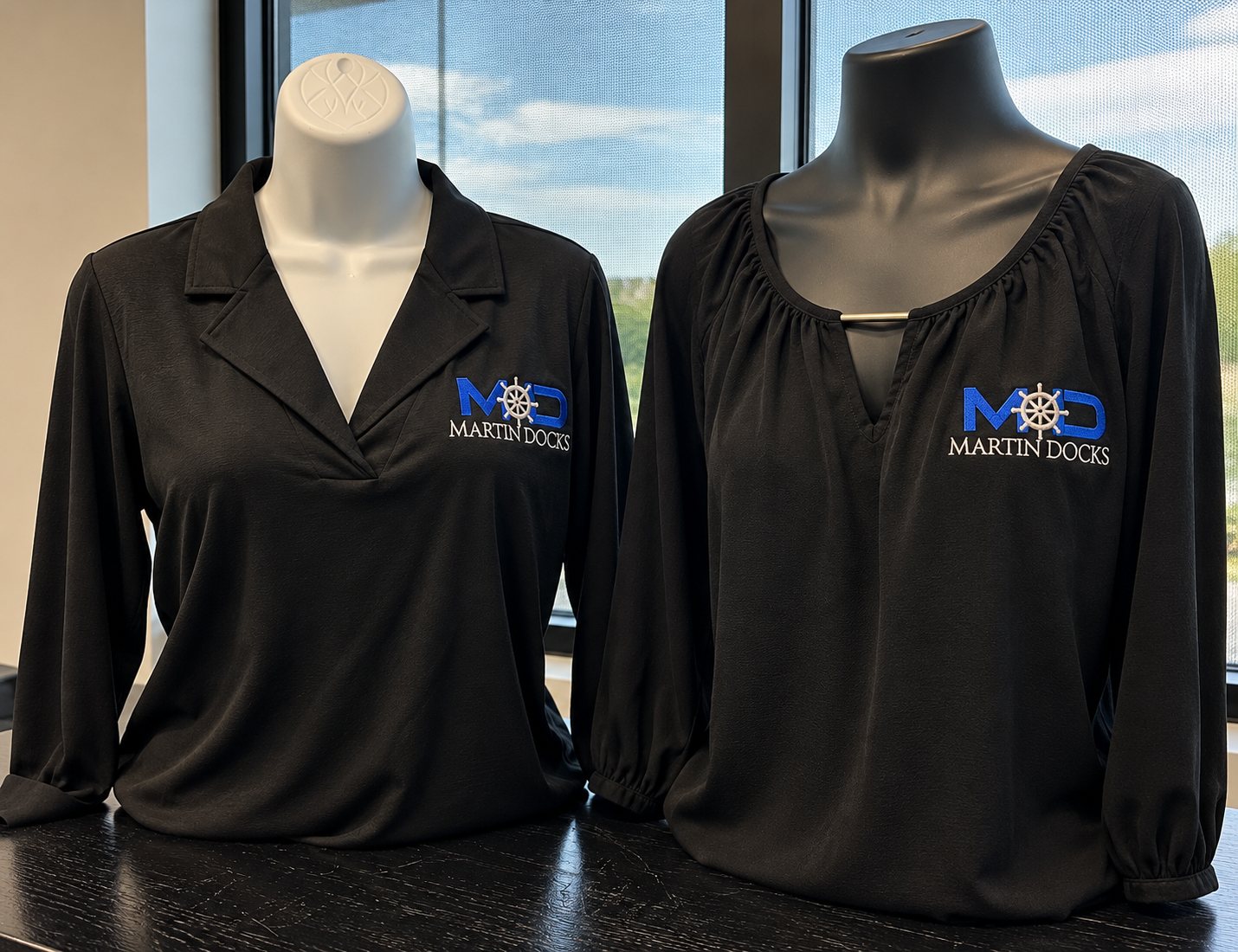 Black business tops embroidered with the Martin Docks logo by 400 Ink in Dawsonville GA