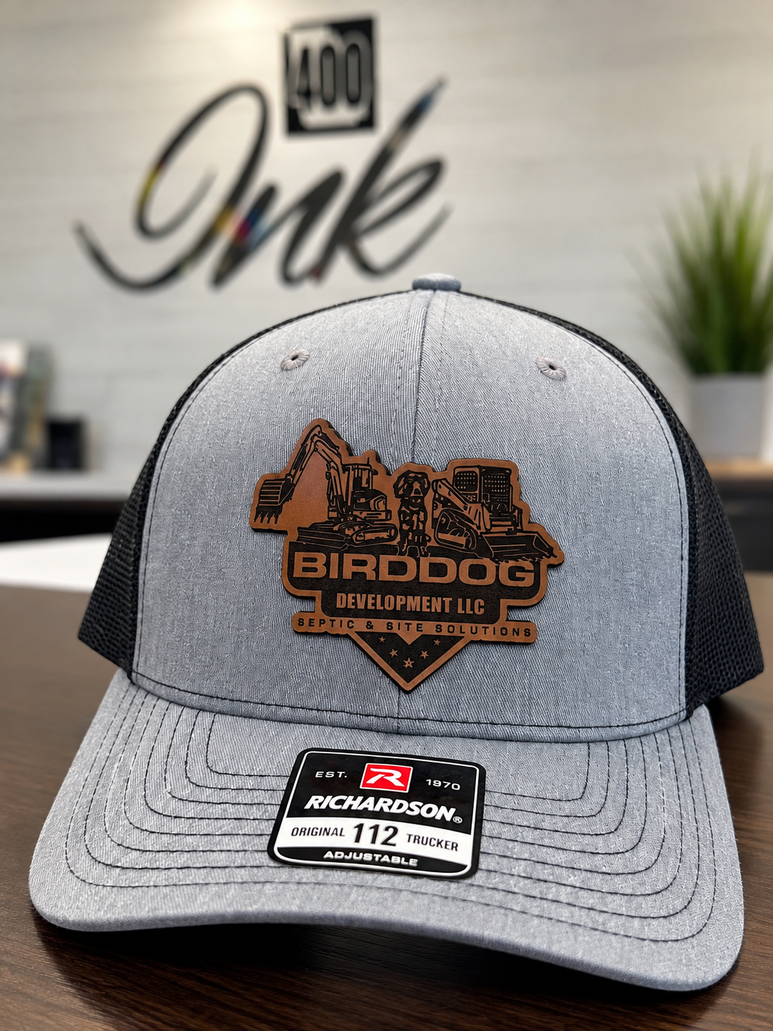 Gray Richardson 112 trucker hat with a genuine leather Birddog patch by 400 Ink in Dawsonville GA